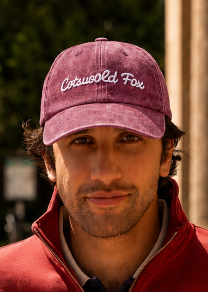 Cotswold Fox unisex washed  burgundy baseball cap with embroidered emblem and adjustable brass buckle at the back. 