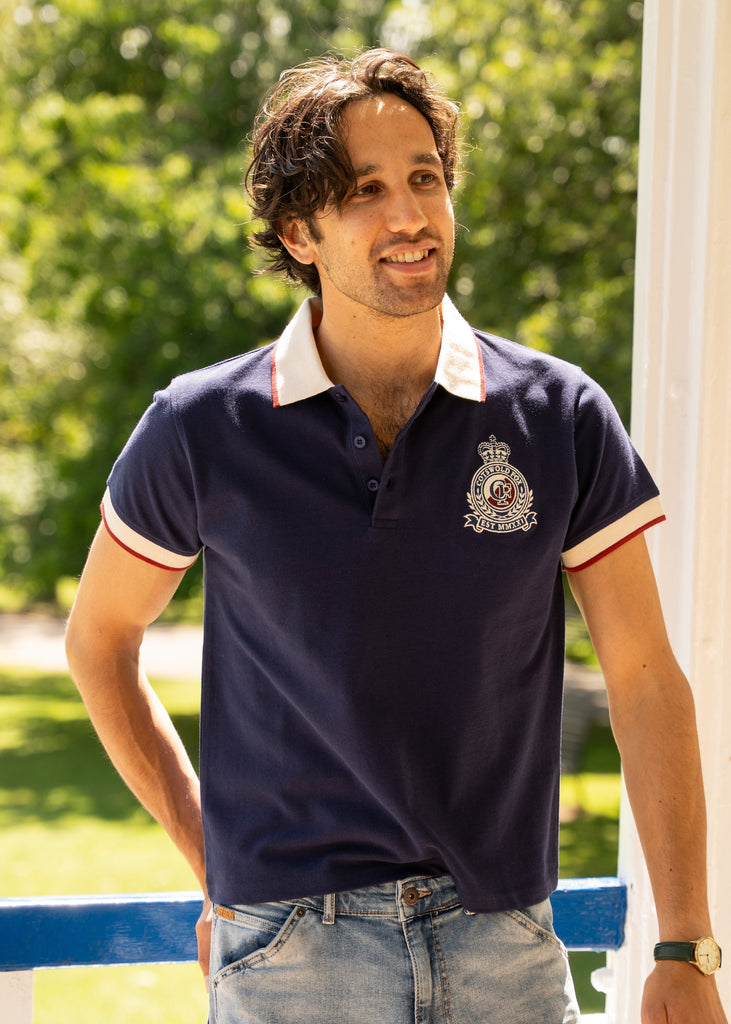 Cotswold Fox 100% organic cotton Heritage polo top. Navy blue unisex polo top with  white collar and embroidered emblem.