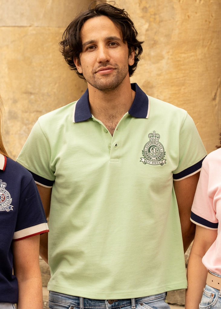 Cotswold Fox 100% organic cotton Heritage polo top. Mint green unisex polo top with navy collar and embroidered emblem.