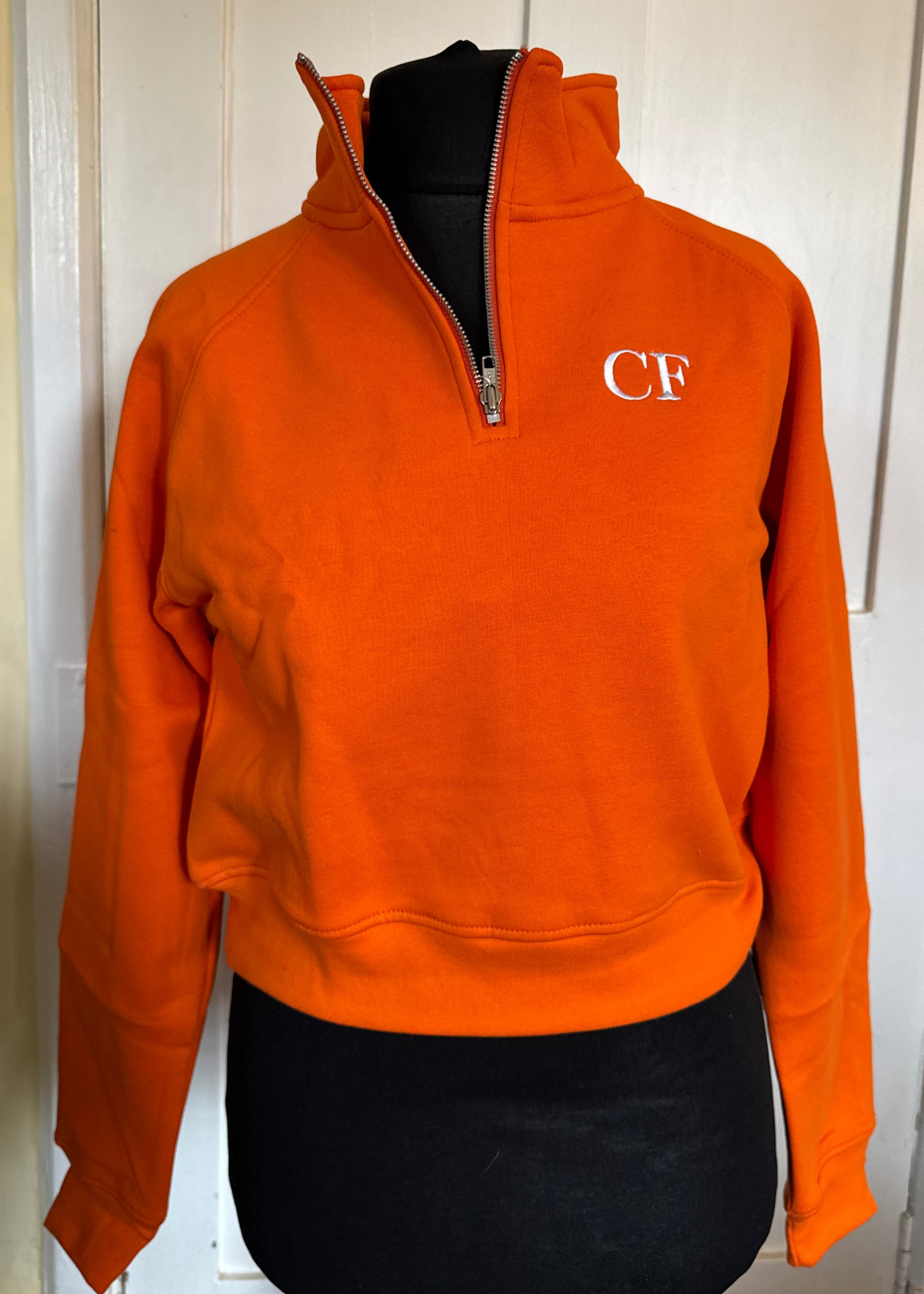 Sample: Cropped Quarter Zip - Orange. Small