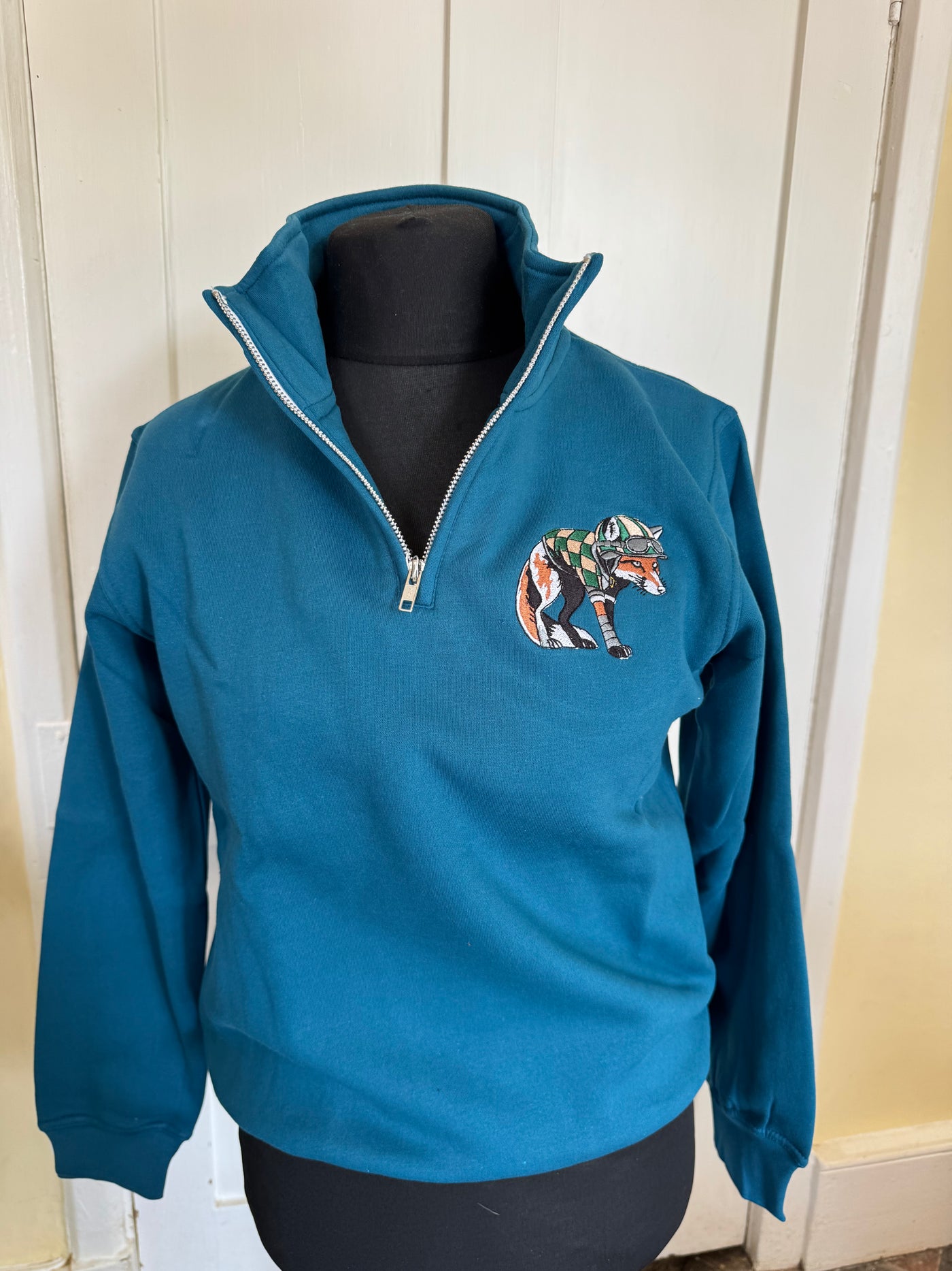 Sample: Fox Quarter Zip - Teal. Small